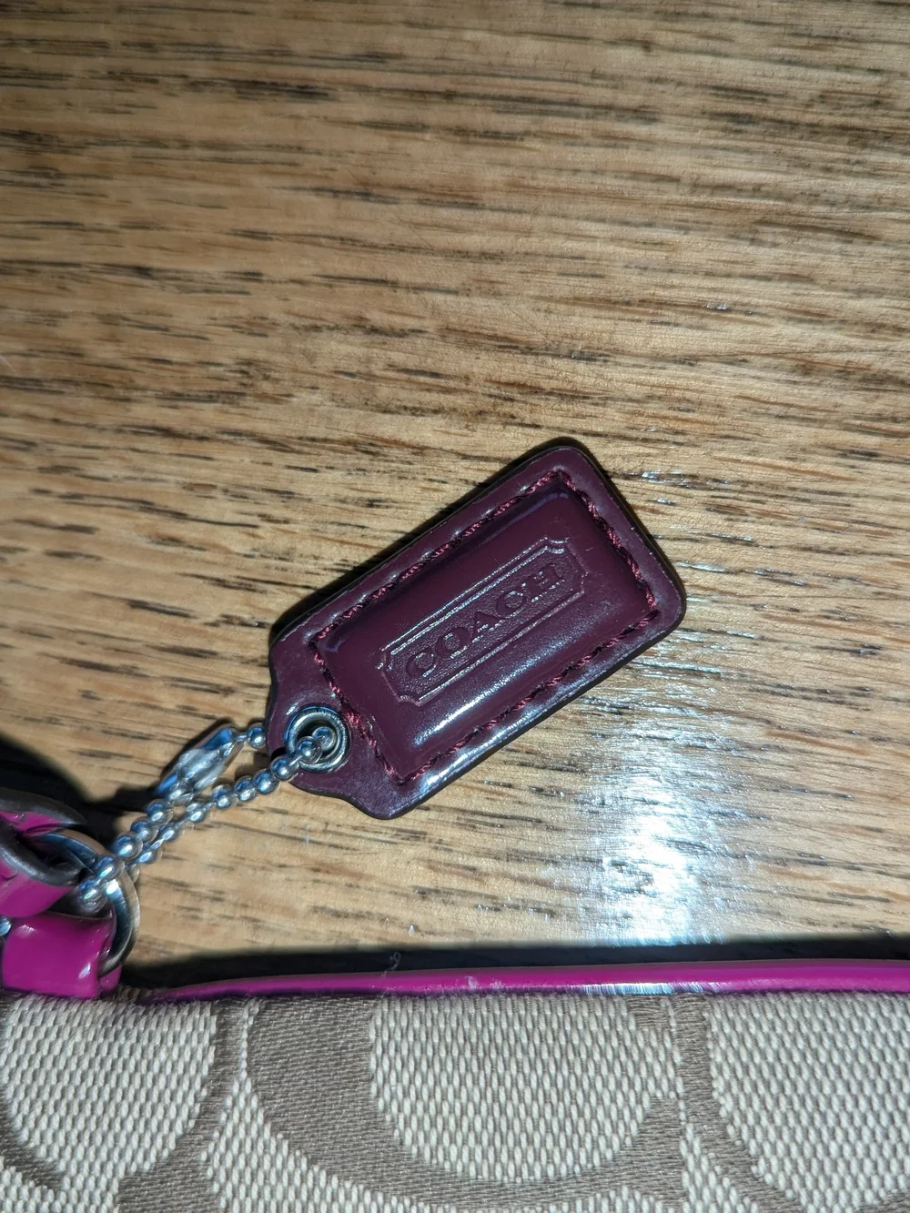 Coach Signature Canvas Wristlet in Tan with Pink Trim